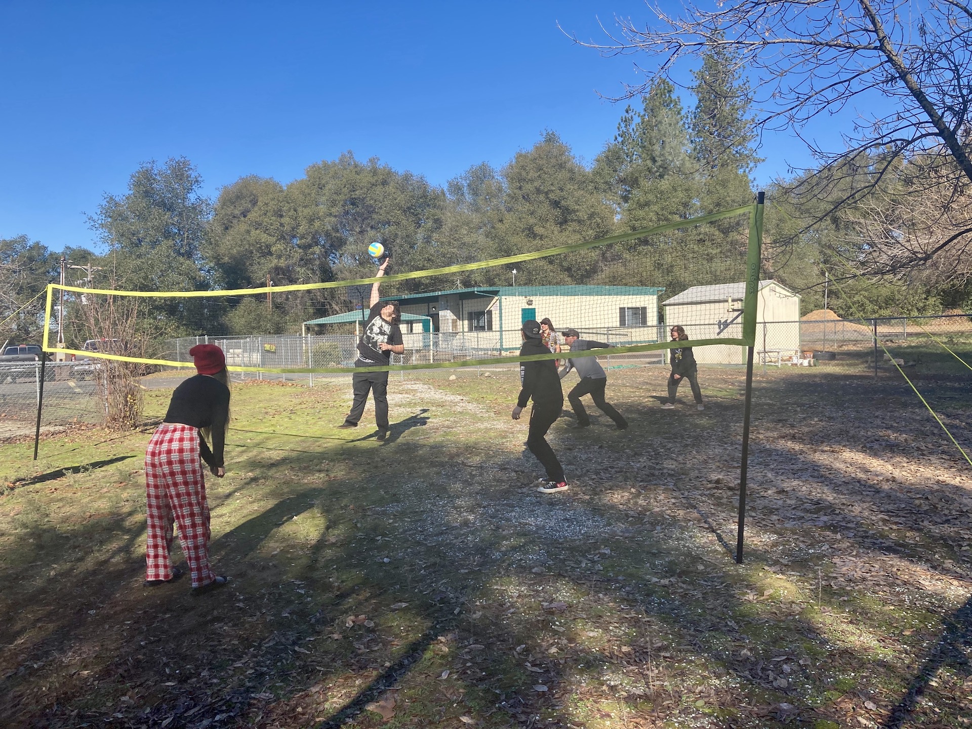 TLC Students playing volleyball.